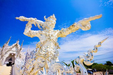 Asya 'da Tayland, Chiang Rai' deki Wat Rong Khun tapınağının beyaz heykeli.
