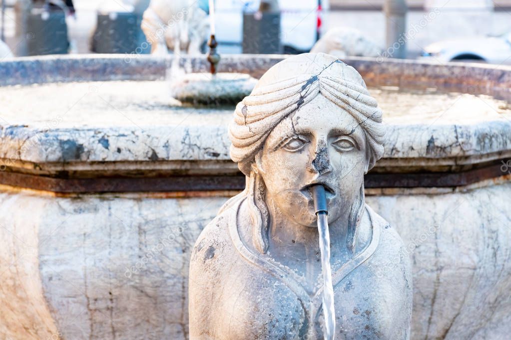 Sculpture of Cantarini fountain at Piazza Veccia square of medieval town of Bergamo in the evening. Taken in Citta Alta, Bergamo, Lombardia, Italy.