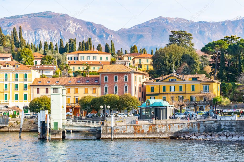Beautiful view of the Bellagio resort town seen from Lake Como on sunset, Lombardy, Italy.
