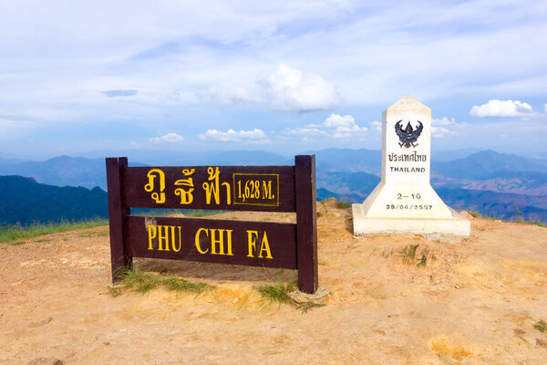 Chiang Rai, Thailand, July 1 2015: Boundary mark between Thailand and Laos on the Phu Chi Fa Summit
