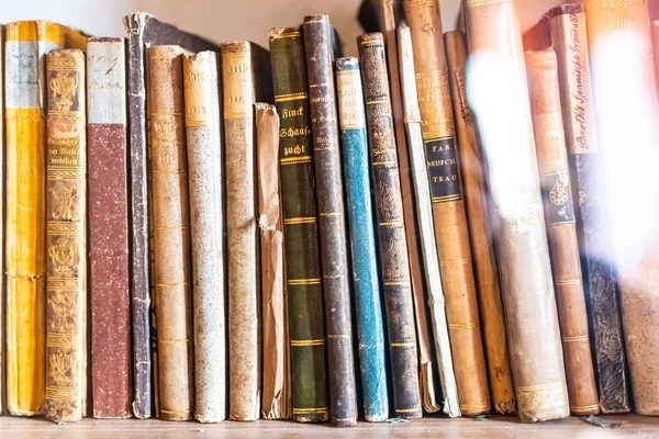Beautiful ancient old books on shelf in the library — Stock Photo, Image