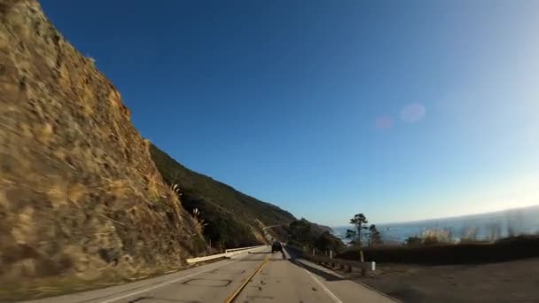Conducción en Big Sur California Cabrillo Highway 1 coast road, pov south black truck — Vídeos de Stock
