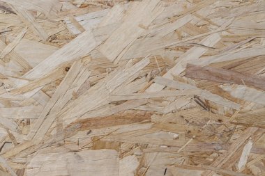 Ütülenmiş ve yapıştırılmış odun parçaları. Çizim tahtası soyut arkaplanı. Büyük ahşap parçalarından gelen kontrplak dokusu.