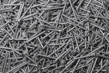 Metal Çiviler. Doku. Bir sürü yeni demir çivi. Duvar kağıdı için arkaplan.