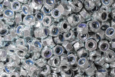 Kaçık. Doku. Cıvata ve vida için bir sürü lastik fındık. Duvar kağıdı için arka plan. Kadın düzüşmesi. Çatlak herif. İç vida.