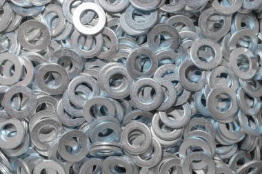 Cıvata için çamaşır makinesi. Doku. Cıvata ve vidalar için bir sürü çamaşır makinesi. Duvar kağıdı için arka plan. Shim. Boşluk.