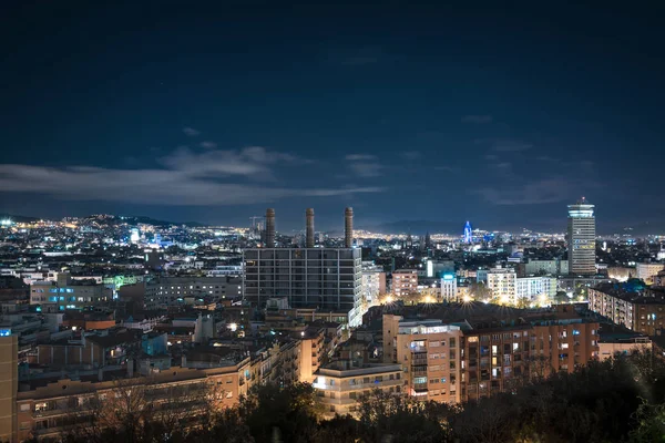 Barcelona at night, the city illuminated.