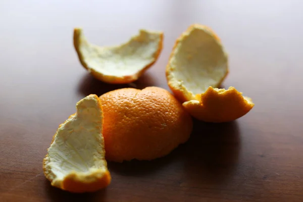 Orange peels laying on table