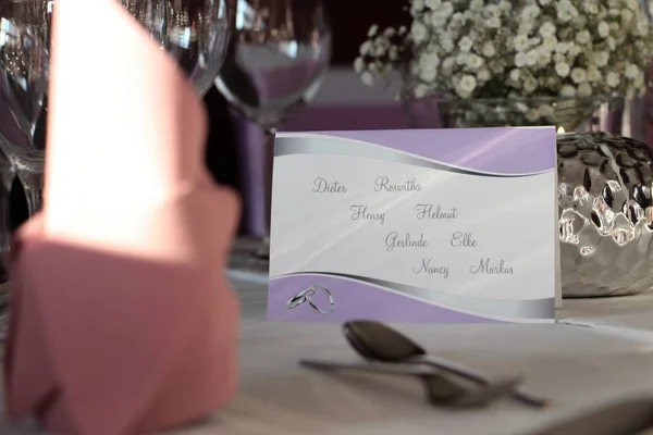 Wedding table decoration with invitation list