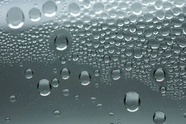 Water drops macro from a plastic bottle fifty megapixels — Stock Photo, Image