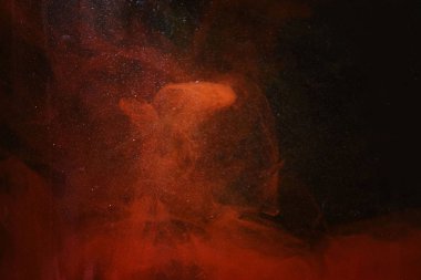 spot renkleri kırmızı boyayla su koyu arka plan doku closeup makro