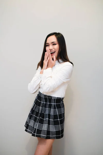 Asian girl with nice outfit, short skirt and long sleeve shirt — Stock Photo, Image