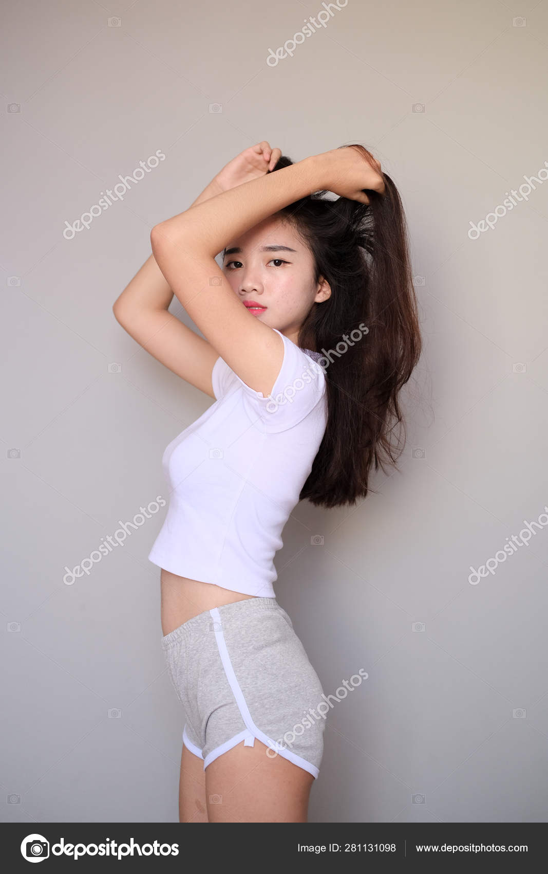 Asian girl wearing sportswear attire shots body length. Stock Photo by  ©mkqayyum@gmail.com 281131098