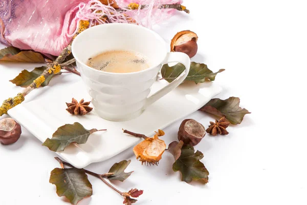 Autumn composition. Cup of coffee and leaves on white background. Flat lay, top view, copy space Autumn