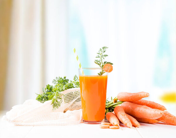 Fresh juice on wooden table 