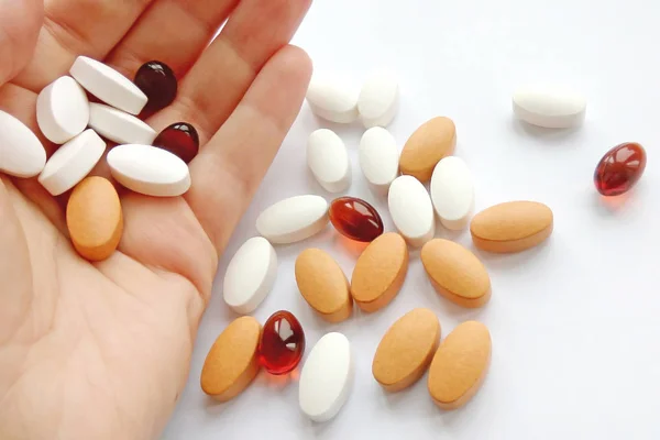 Assorted Colorful Pharmaceutical Medicine Pills Tablets Capsules Hand White Background — Stock Photo, Image