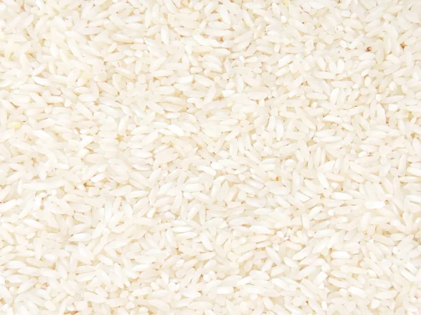 Light food background with small long asian white rice