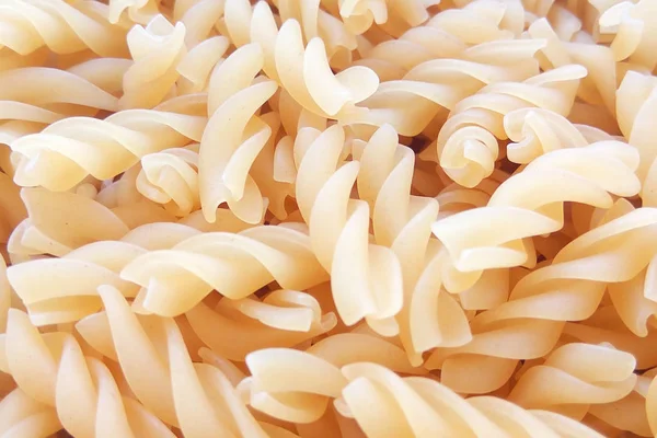 Texturerat Italiensk Mat Bakgrund Okokt Fusilli Pasta Top Visa Platt — Stockfoto