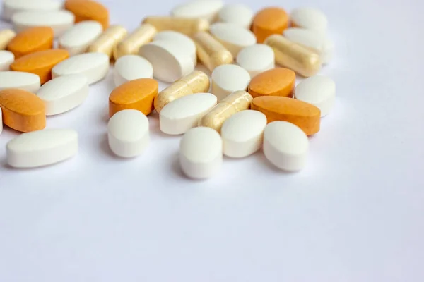 Mnoho Různých Prášků Farmaceutické Medicíny Tablet Tobolek Bílém Podkladu Lékárna — Stock fotografie