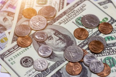 American coins on dollar usa background. Financial concept.