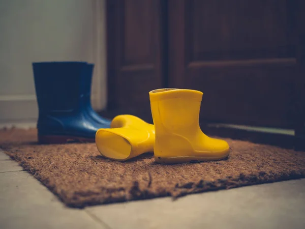 Two Pairs Rubber Boots Open Door — Stock Photo, Image