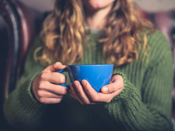 Young Woman Wearing Jumper Sitting Sofa Cup Tea — Stock Photo, Image
