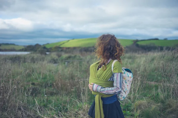 Young Mother Walking Countryside Her Baby Sling — Stock Photo, Image