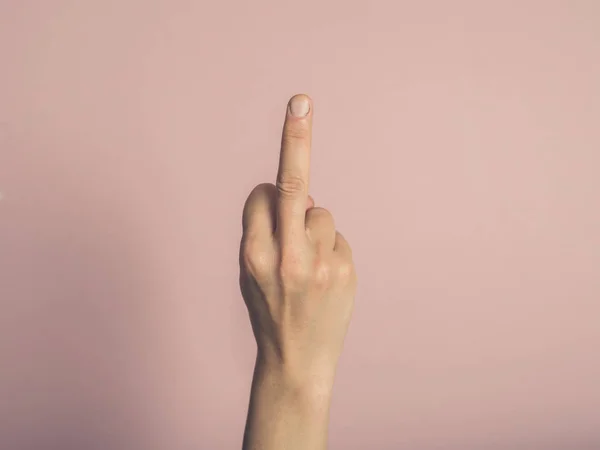 Young Female Hand Displaying Rude Gesture — Stock Photo, Image