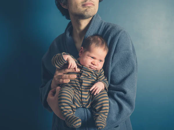Young Father Wearing Bathrobe Holding His Baby Son — Stock Photo, Image