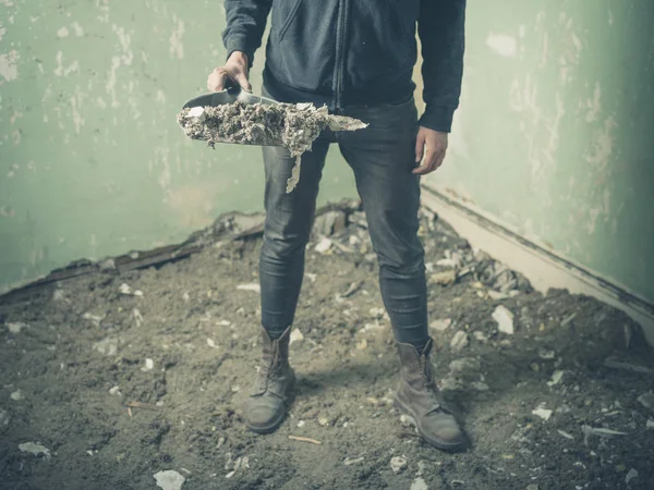 Young Person Standing Derelict Room Holding Dustpan Full Rubble — Stock Photo, Image