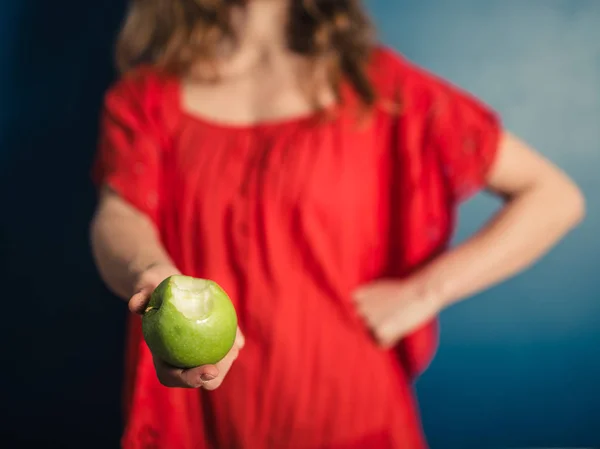 Young Woman Red Dress Holding Half Eaten Apple — Stock Photo, Image