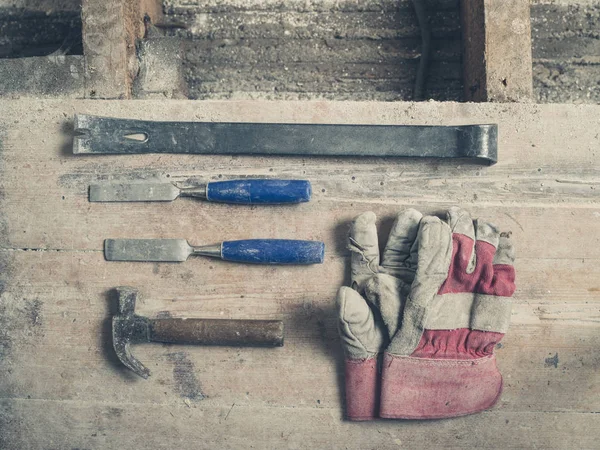 Pair Workman Gloves Crowbar Two Chisels Hammer Wooden Floor — Stock Photo, Image