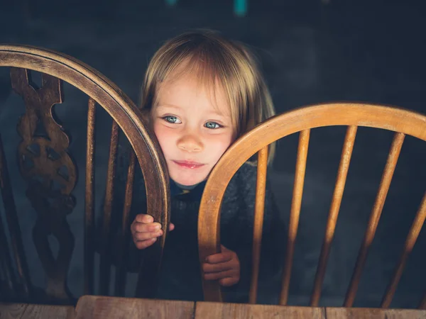 Little Toddler Hiding Some Chairs Cafe — Stock Photo, Image