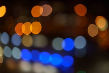 Bulanık mavi, turuncu ve sarı bokeh ışıklar arka plan