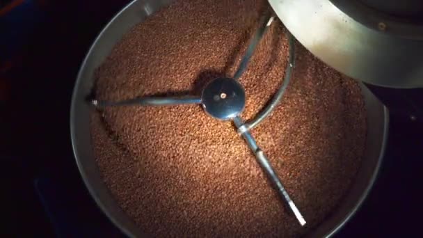 Mixing roasted coffee beans close-up in 4k — Stock Video