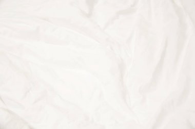 Beyaz yatak örtülerini kapat ve boşluğu kopyala.