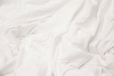 Beyaz yatak örtülerini kapat ve boşluğu kopyala.