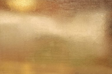 Altın soyut arkaplan veya doku ve gradyan gölgesi.
