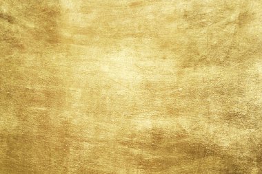 Altın soyut arkaplan veya doku ve gradyan gölgesi.