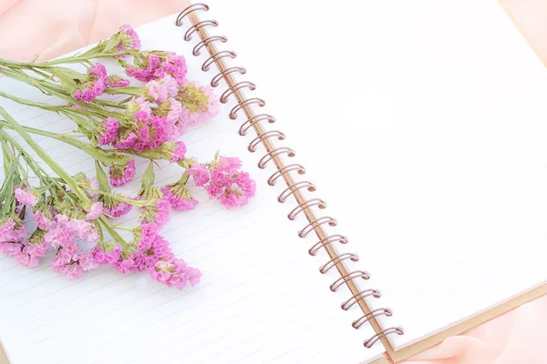 White Open Notebook Purple Flower Pink Fabric Soft Focus Orange — Stock Photo, Image