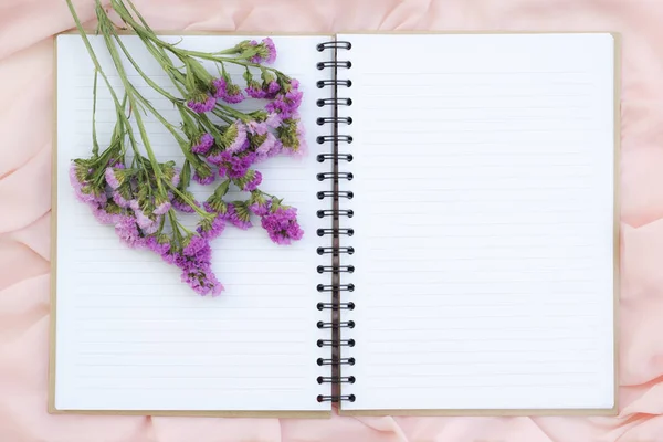 Open Notebook Violet Flower Pink Fabric Copy Space — Stock Photo, Image