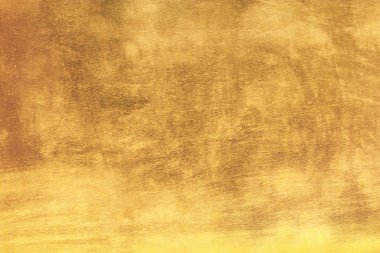 Altın soyut arkaplan veya doku ve gradyan gölgesi.