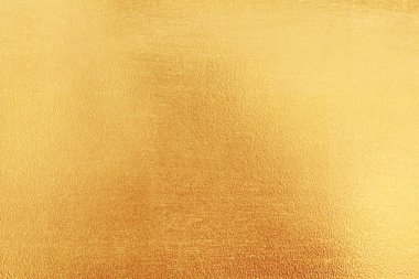 Altın soyut arkaplan veya doku ve gradyan gölgesi.
