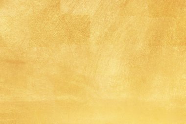 Altın soyut arkaplan veya doku ve gradyan gölgesi.