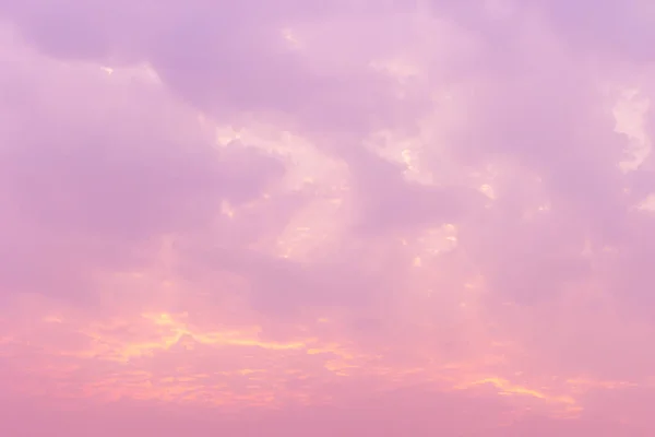 Dreamy purple sky background and clouds soft focus, and copy space.