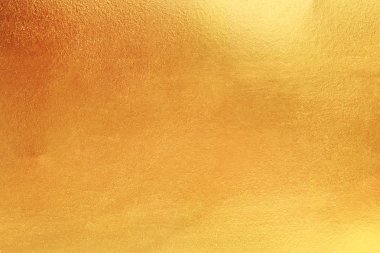 Altın soyut arkaplan veya doku ve gradyan gölgesi.
