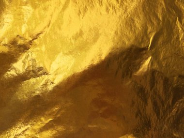 Altın soyut arkaplan veya doku ve gradyan gölgesi.