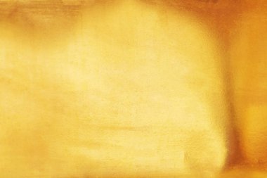 Altın soyut arkaplan veya doku ve gradyan gölgesi.