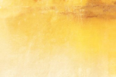 Altın soyut arkaplan veya doku ve gradyan gölgesi.