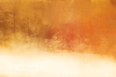 Altın soyut arkaplan veya doku ve gradyan gölgesi.